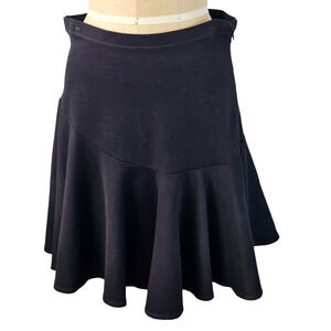 Cabi black ponti skirt with flared asymmetrical peplum size 10